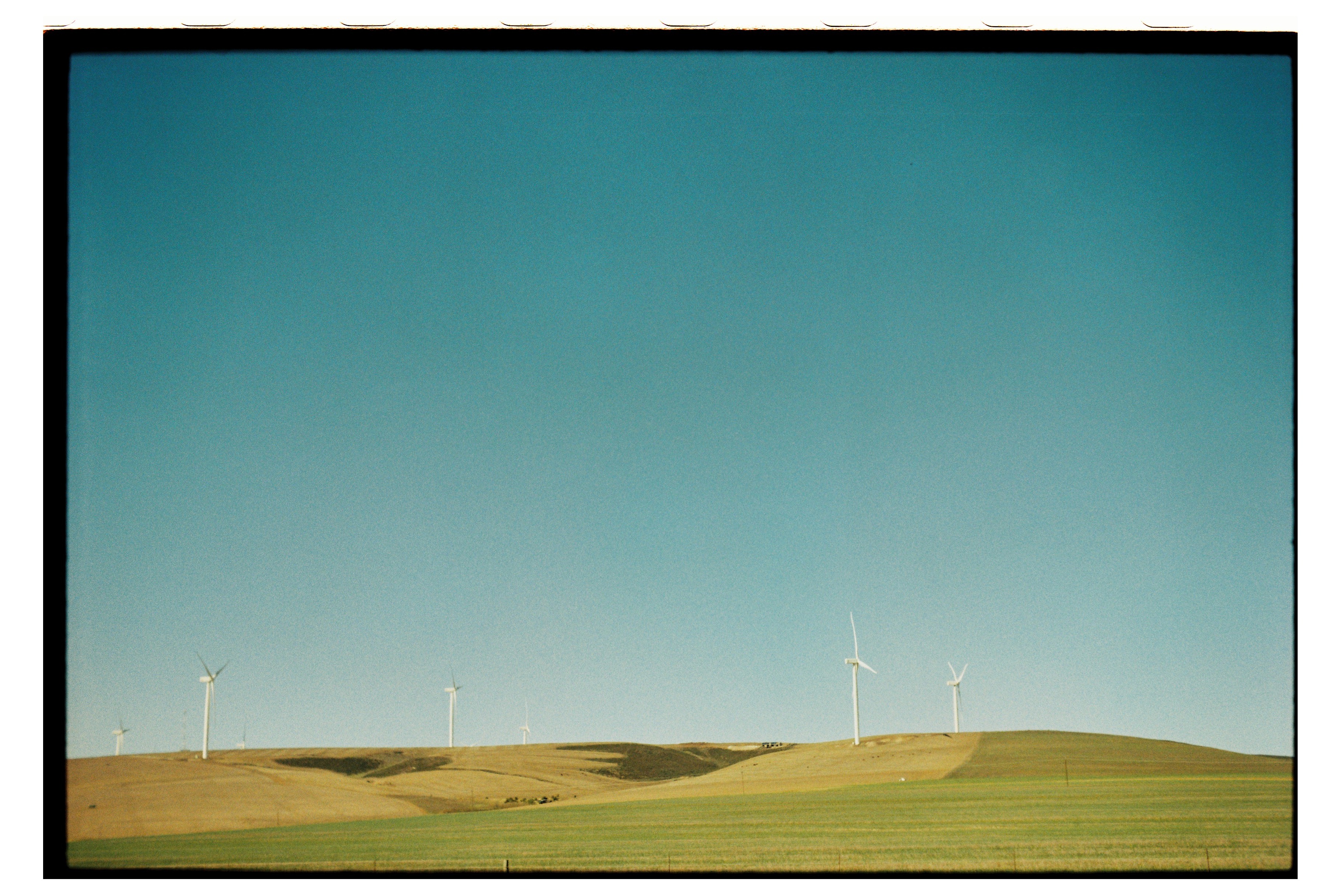 Windmills on a hill, midday